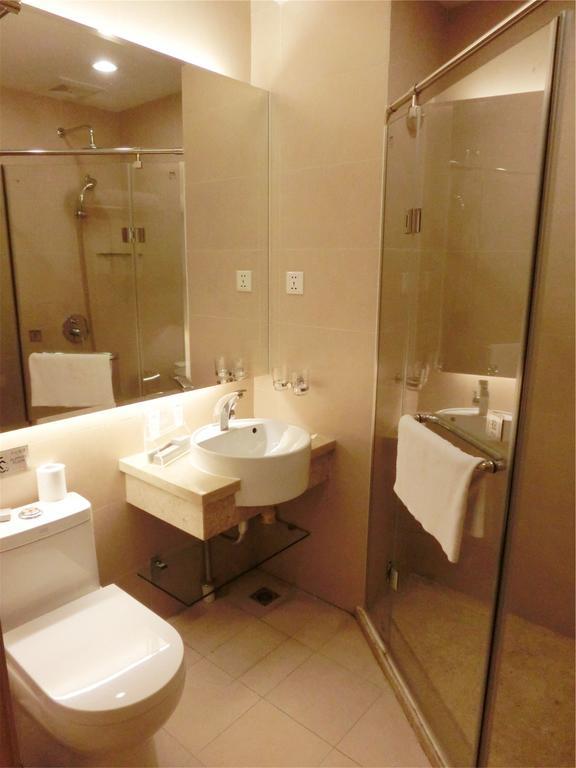 Guangzhou Bauhinia Hotel Quarto foto